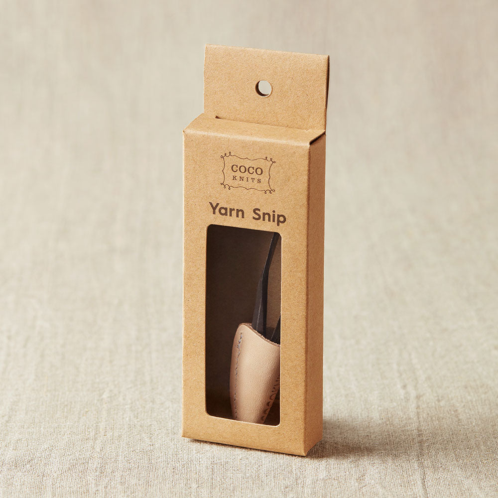 Coupe fil avec capuchon en cuir