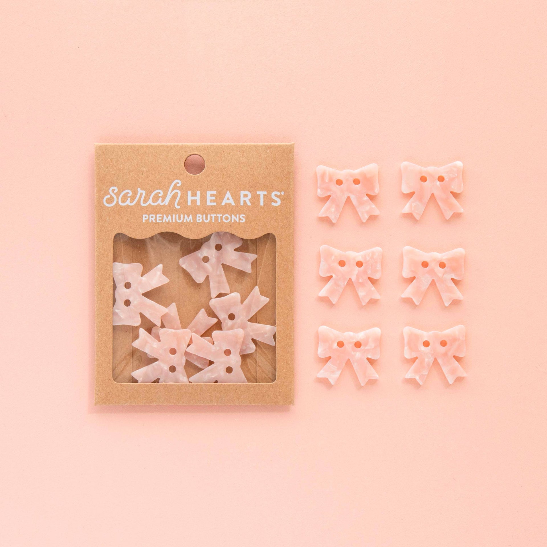Grands boutons Noeuds roses - 25 mm