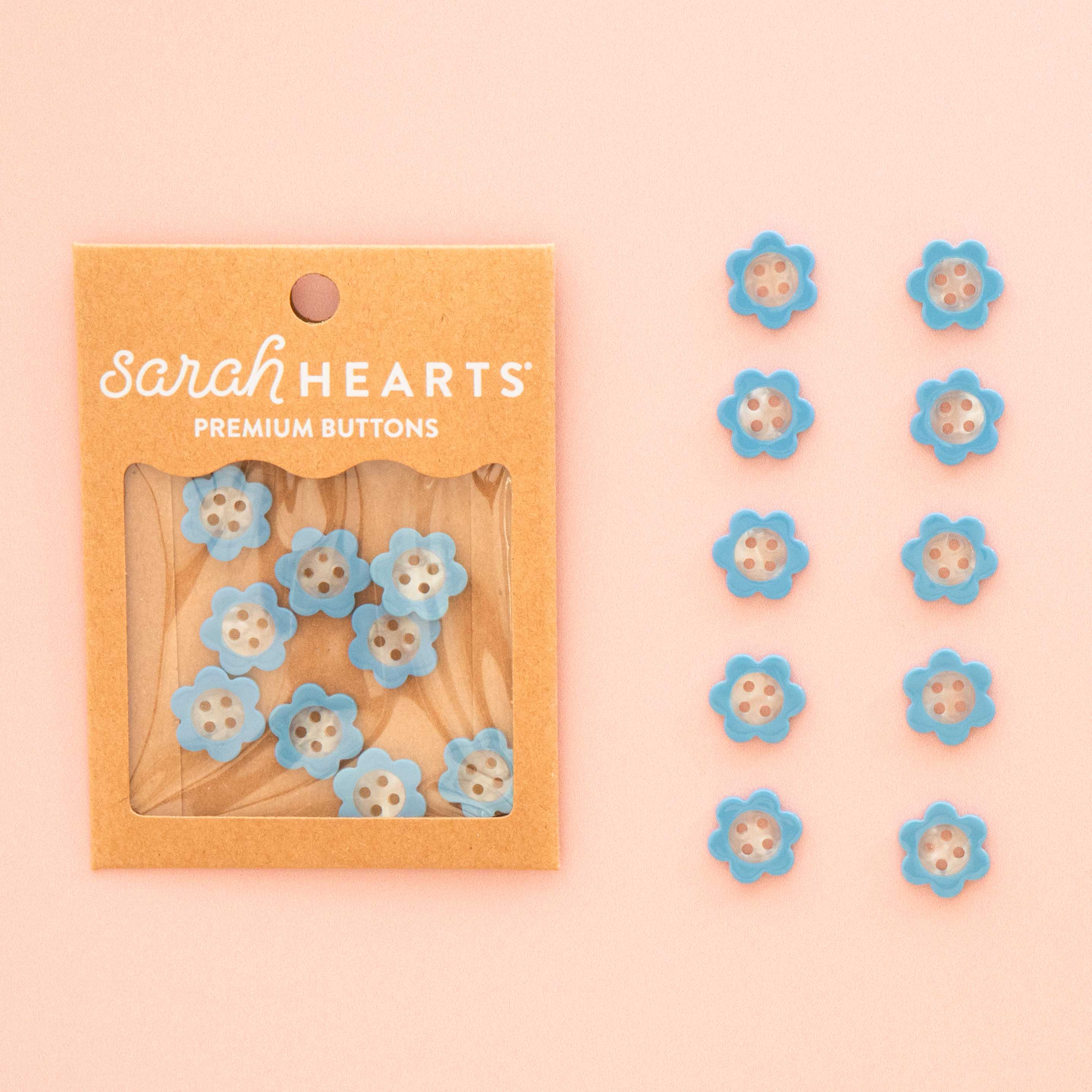 Petits boutons marguerite bleue 15 mm