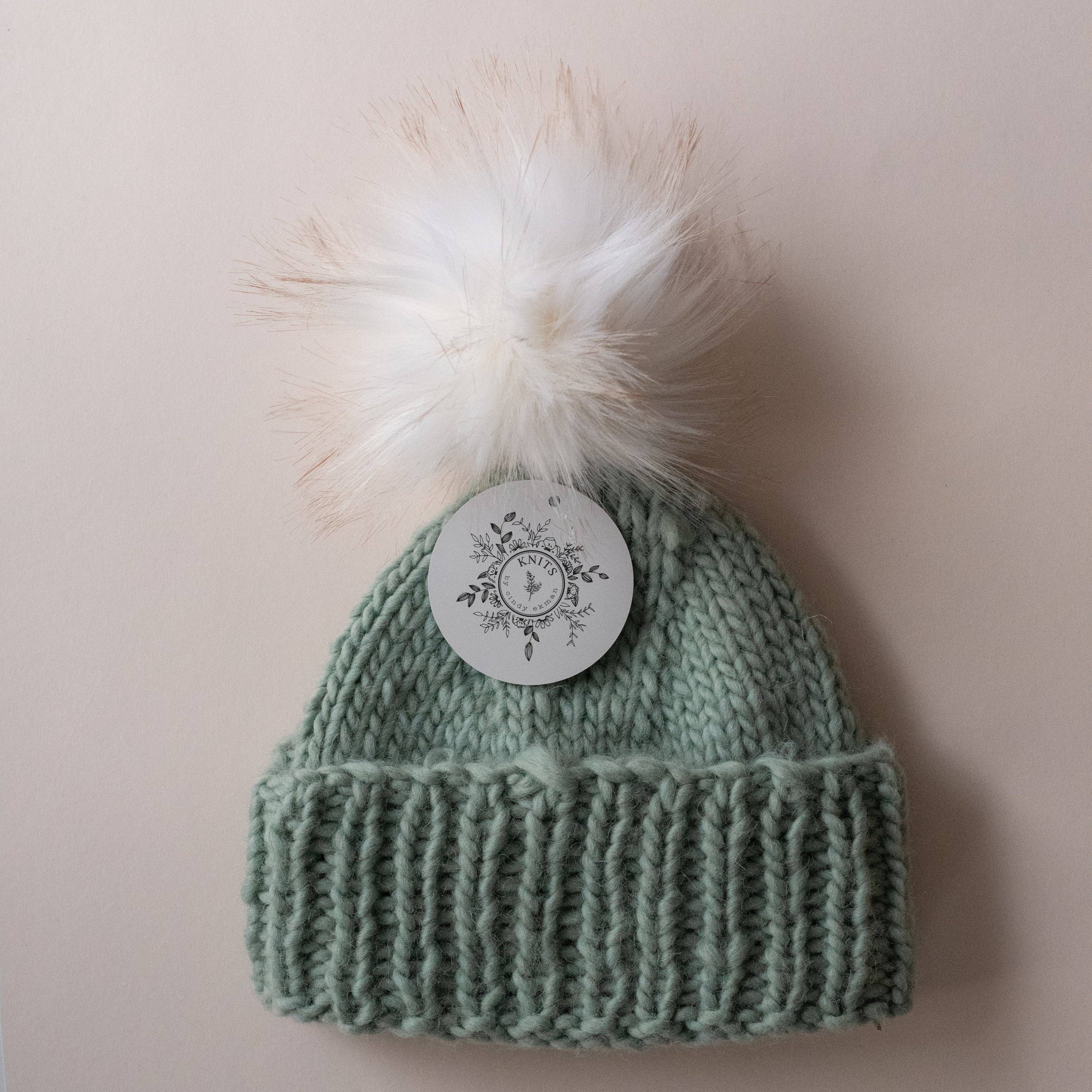 Pompon en fausse fourrure