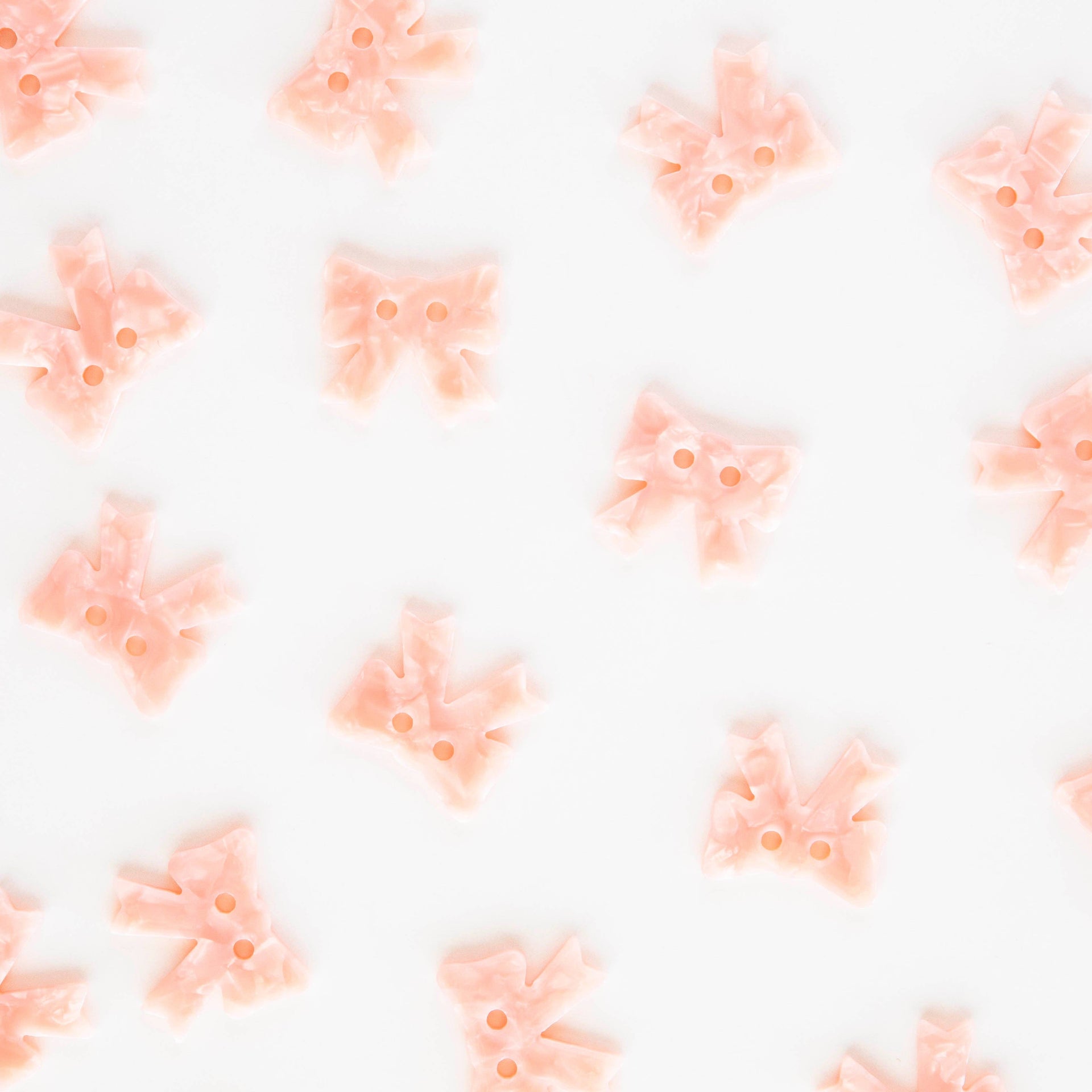 Grands boutons Noeuds roses - 25 mm