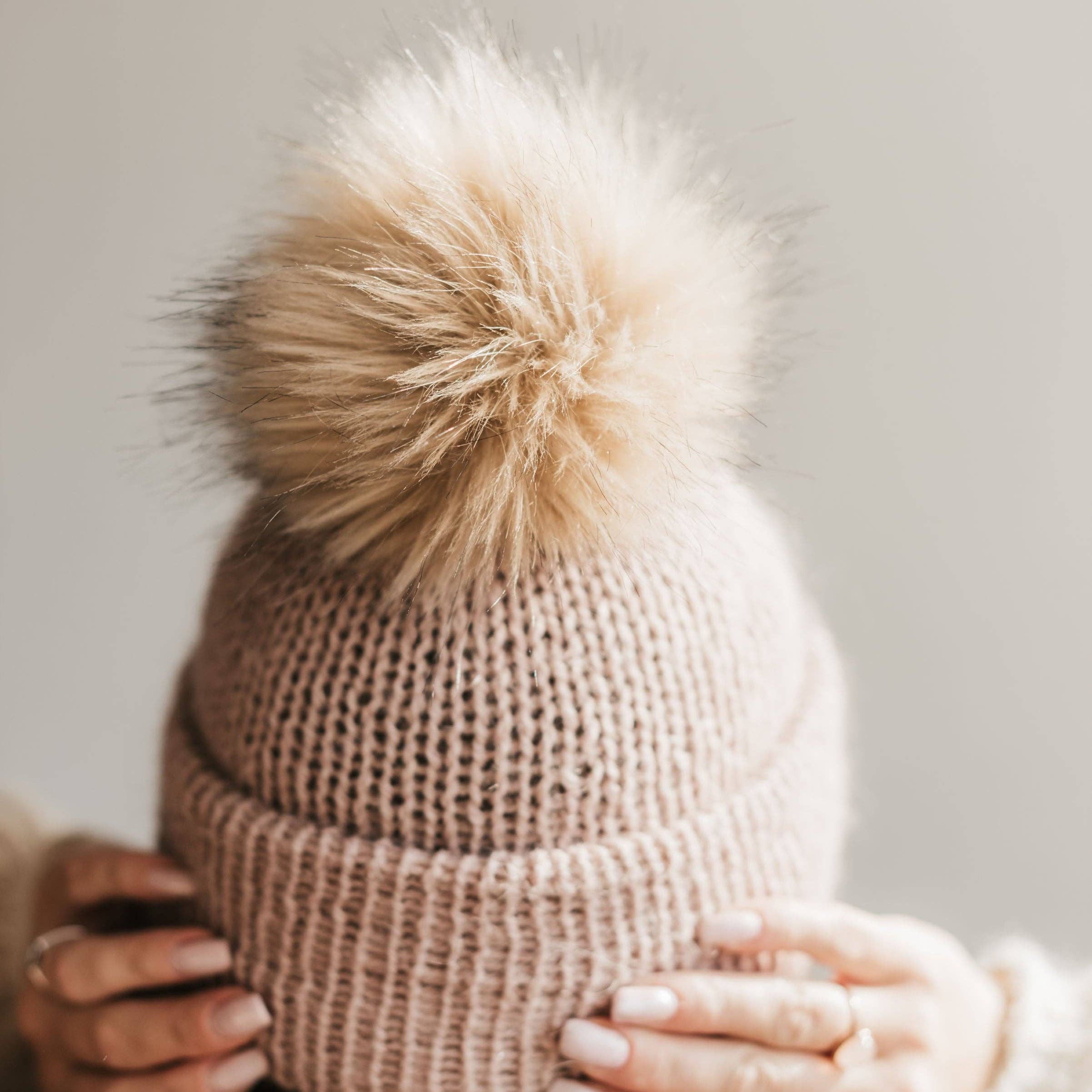 Pompon en fausse fourrure