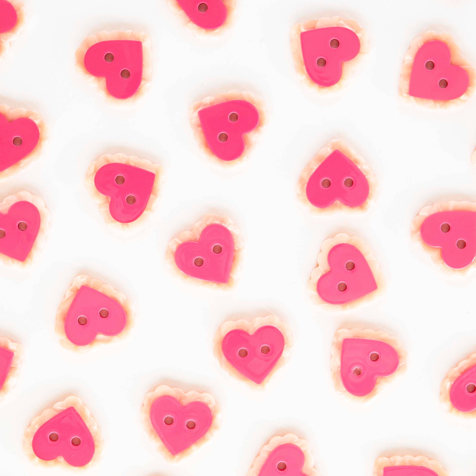 Boutons roses en forme de cœur 25 mm