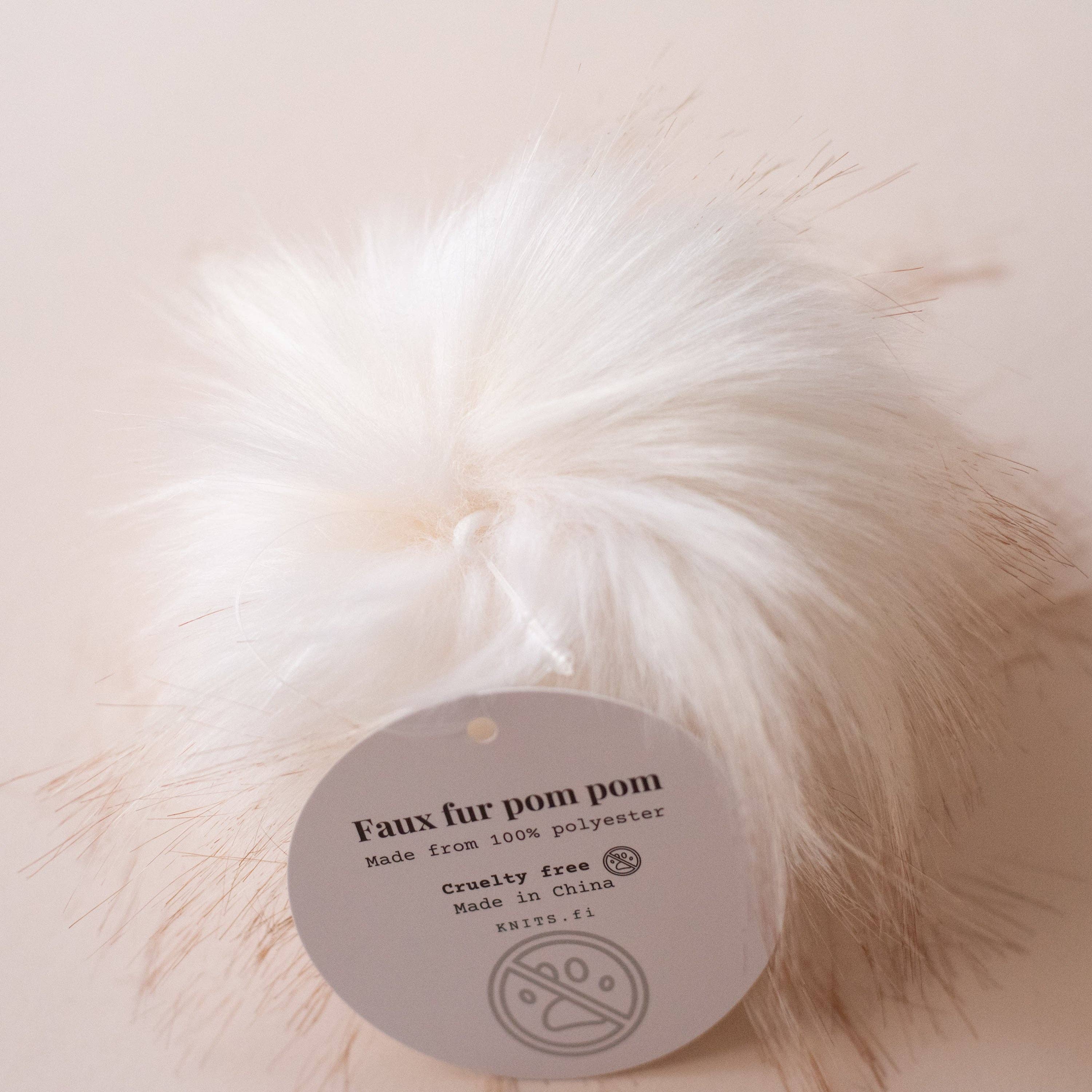 Pompon en fausse fourrure