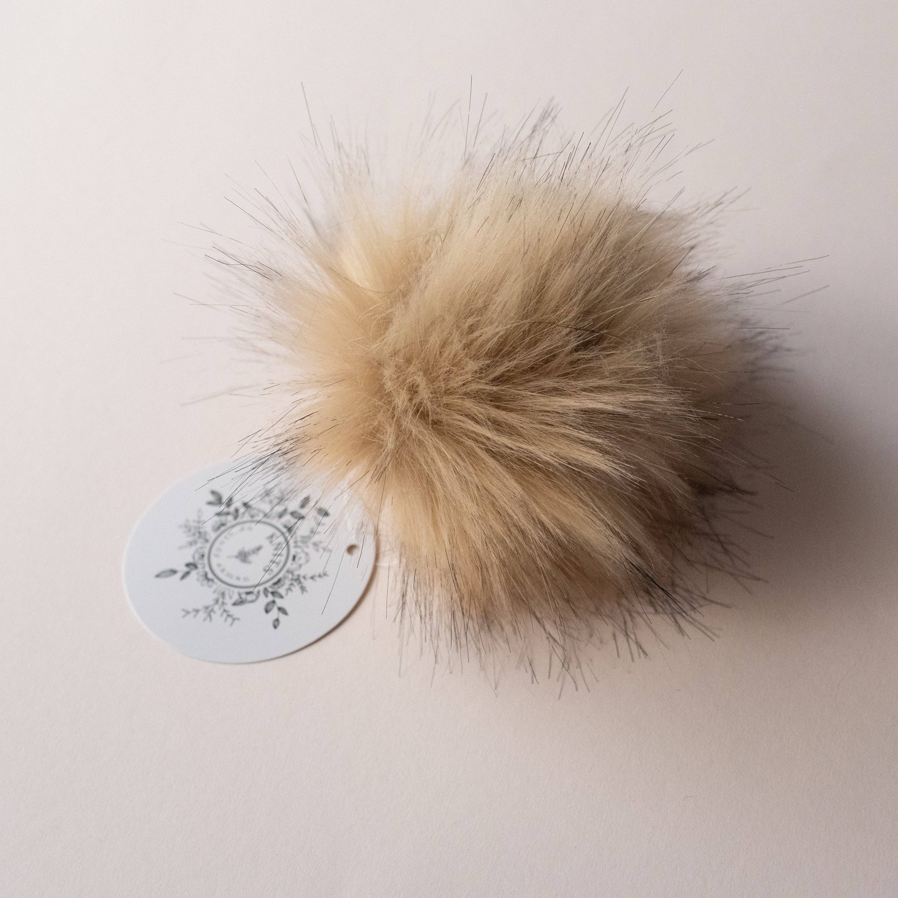 Pompon en fausse fourrure